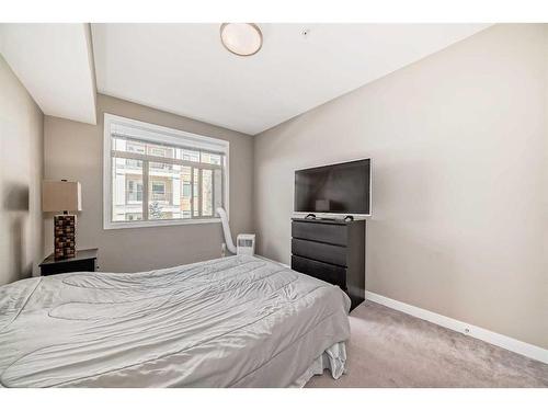 306-22 Auburn Bay Link Se, Calgary, AB - Indoor Photo Showing Bedroom