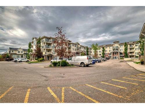 306-22 Auburn Bay Link Se, Calgary, AB - Indoor Photo Showing Garage