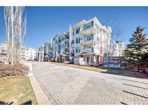 306-22 Auburn Bay Link Se, Calgary, AB - Outdoor With Balcony With Facade