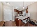 306-22 Auburn Bay Link Se, Calgary, AB  - Indoor Photo Showing Kitchen With Stainless Steel Kitchen With Upgraded Kitchen 