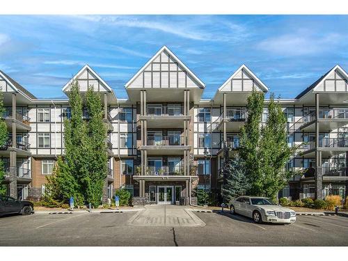 302-6603 New Brighton Avenue Se, Calgary, AB - Outdoor With Balcony With Facade