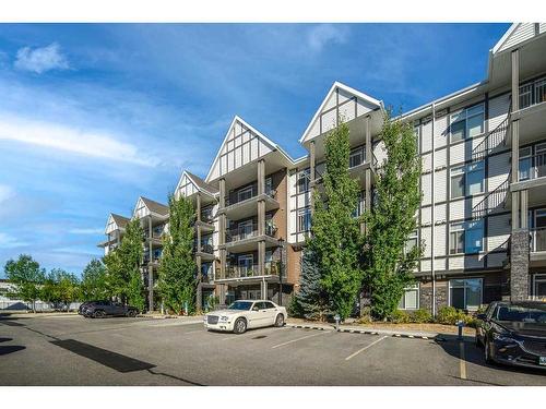 302-6603 New Brighton Avenue Se, Calgary, AB - Outdoor With Balcony With Facade