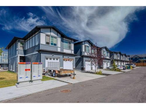 106-116 Saddlestone Heath Ne, Calgary, AB - Outdoor With Facade