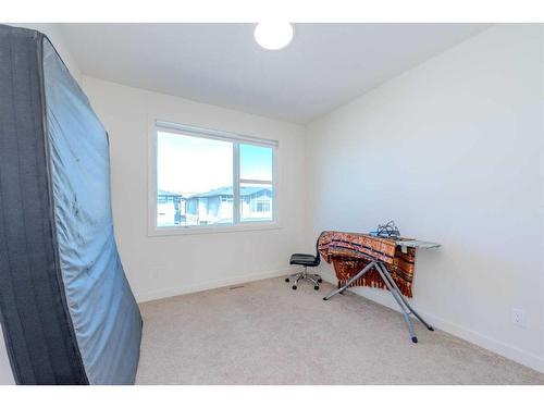 106-116 Saddlestone Heath Ne, Calgary, AB - Indoor Photo Showing Bedroom