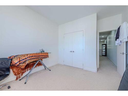 106-116 Saddlestone Heath Ne, Calgary, AB - Indoor Photo Showing Bedroom