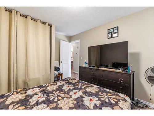 99 Abalone Way Ne, Calgary, AB - Indoor Photo Showing Bedroom