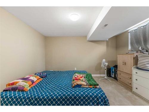 99 Abalone Way Ne, Calgary, AB - Indoor Photo Showing Bedroom