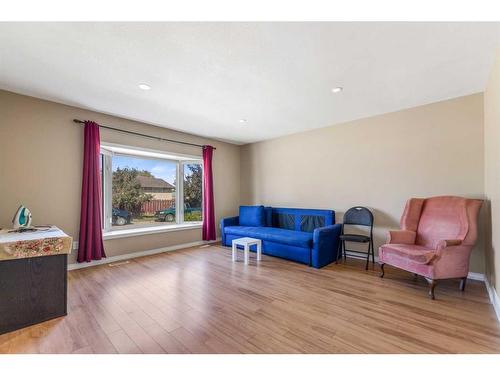 99 Abalone Way Ne, Calgary, AB - Indoor Photo Showing Living Room