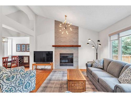 247 Citadel Park Nw, Calgary, AB - Indoor Photo Showing Living Room With Fireplace