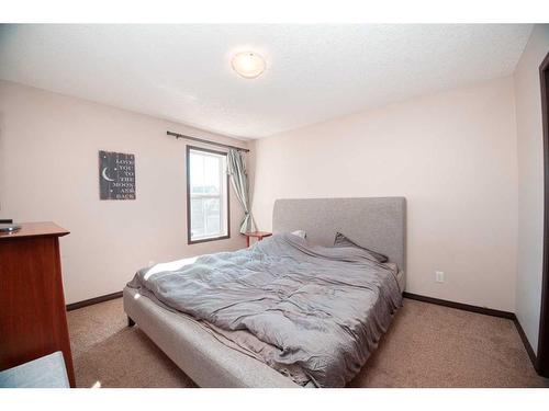 225 Auburn Crest Way Se, Calgary, AB - Indoor Photo Showing Bedroom