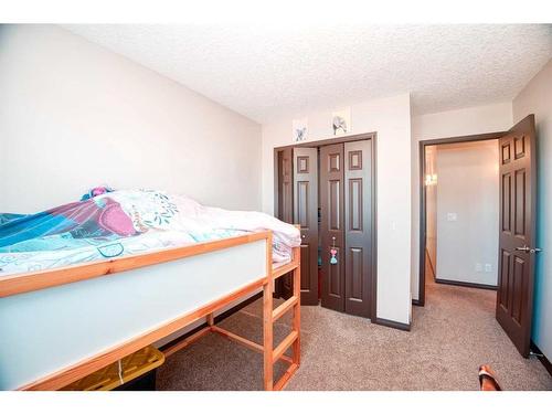 225 Auburn Crest Way Se, Calgary, AB - Indoor Photo Showing Bedroom