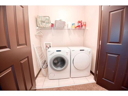 225 Auburn Crest Way Se, Calgary, AB - Indoor Photo Showing Laundry Room