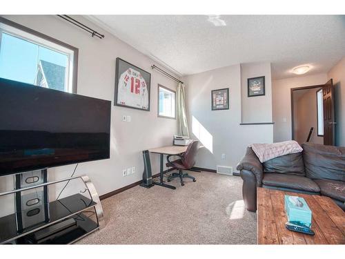 225 Auburn Crest Way Se, Calgary, AB - Indoor Photo Showing Living Room