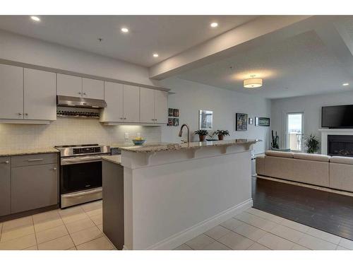 2307-10221 Tuscany Boulevard Nw, Calgary, AB - Indoor Photo Showing Kitchen With Upgraded Kitchen