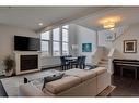 2307-10221 Tuscany Boulevard Nw, Calgary, AB  - Indoor Photo Showing Living Room With Fireplace 