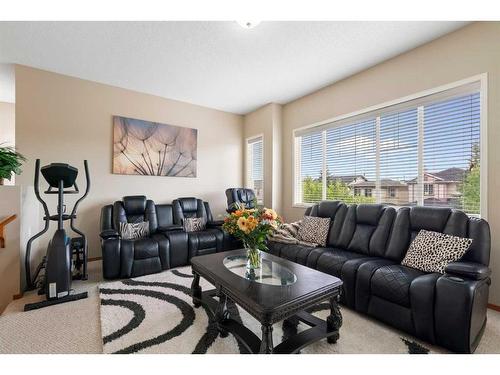 192 Eversyde Way Sw, Calgary, AB - Indoor Photo Showing Living Room