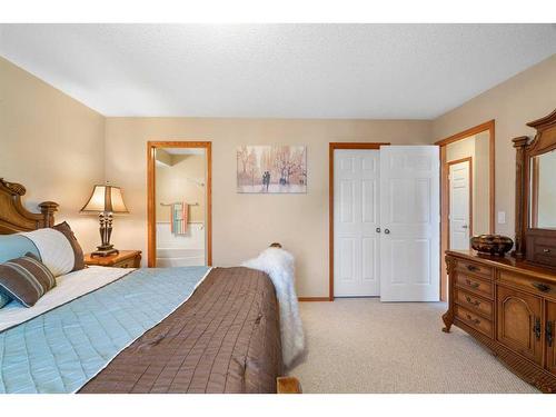 192 Eversyde Way Sw, Calgary, AB - Indoor Photo Showing Bedroom