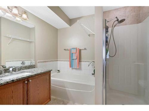 192 Eversyde Way Sw, Calgary, AB - Indoor Photo Showing Bathroom