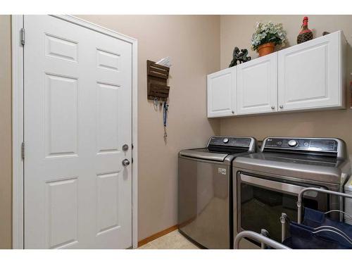 192 Eversyde Way Sw, Calgary, AB - Indoor Photo Showing Laundry Room