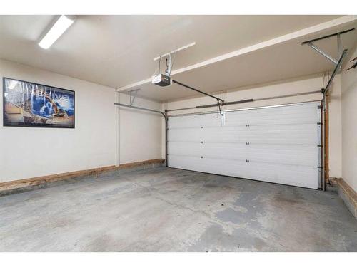 192 Eversyde Way Sw, Calgary, AB - Indoor Photo Showing Garage