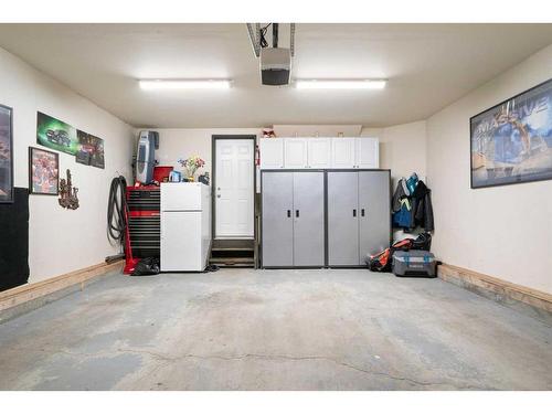 192 Eversyde Way Sw, Calgary, AB - Indoor Photo Showing Garage