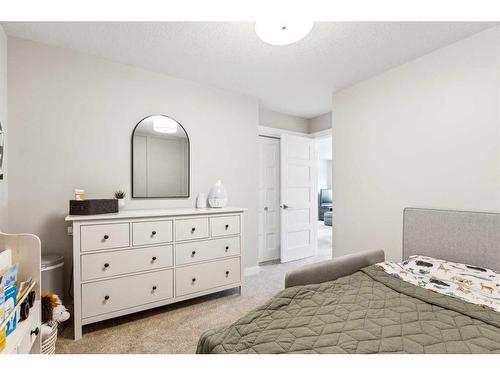 573 Douglas Woods Mews Se, Calgary, AB - Indoor Photo Showing Bedroom