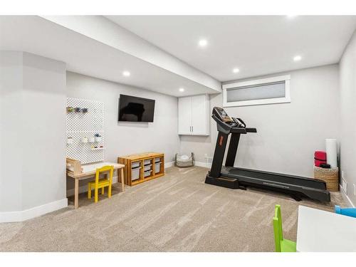 573 Douglas Woods Mews Se, Calgary, AB - Indoor Photo Showing Gym Room