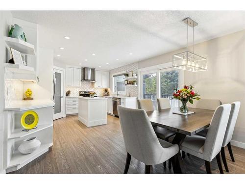 573 Douglas Woods Mews Se, Calgary, AB - Indoor Photo Showing Living Room With Fireplace