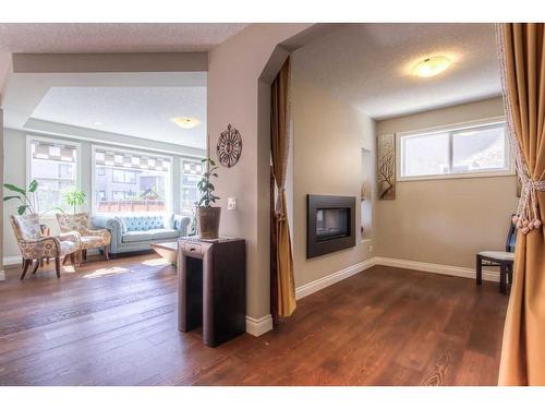 13 Marquis View Se, Calgary, AB - Indoor With Fireplace