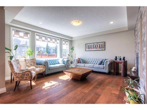 13 Marquis View Se, Calgary, AB - Indoor Photo Showing Living Room