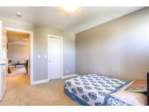 13 Marquis View Se, Calgary, AB - Indoor Photo Showing Bedroom