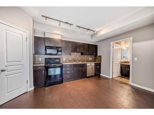 77-77 Auburn Bay Common Se, Calgary, AB - Indoor Photo Showing Kitchen With Stainless Steel Kitchen