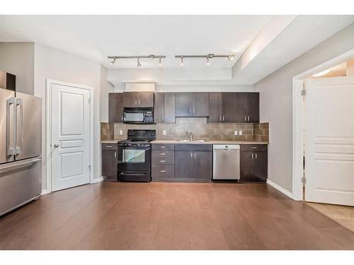 77-77 Auburn Bay Common Se, Calgary, AB - Indoor Photo Showing Kitchen With Stainless Steel Kitchen