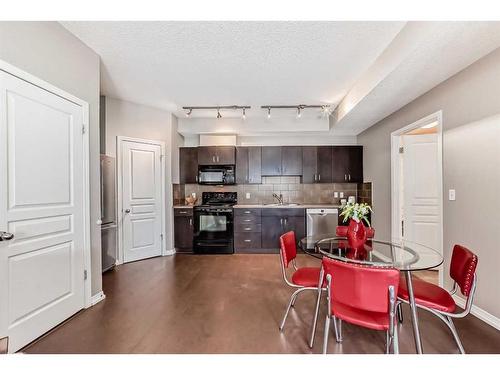 77-77 Auburn Bay Common Se, Calgary, AB - Indoor Photo Showing Kitchen With Stainless Steel Kitchen With Double Sink