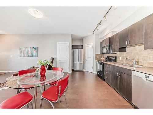 77-77 Auburn Bay Common Se, Calgary, AB - Indoor Photo Showing Kitchen With Double Sink