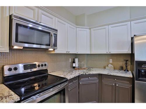 1-1932 24A Street Sw, Calgary, AB - Indoor Photo Showing Kitchen With Upgraded Kitchen