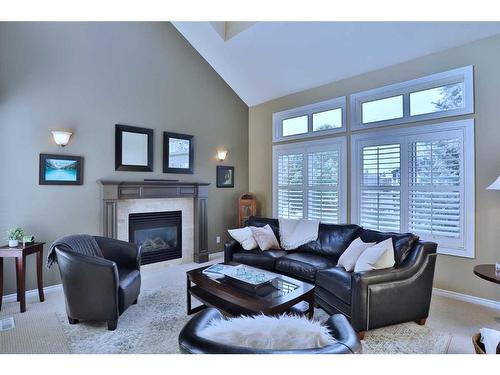 1-1932 24A Street Sw, Calgary, AB - Indoor Photo Showing Living Room With Fireplace