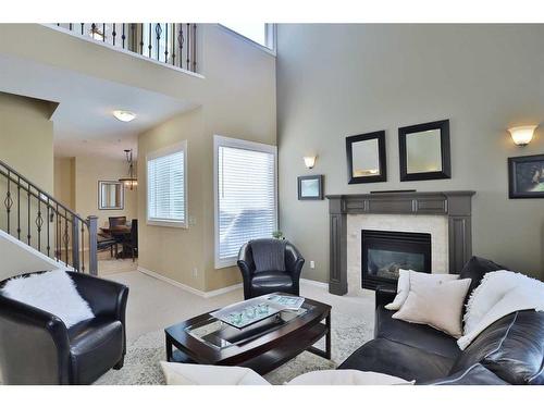 1-1932 24A Street Sw, Calgary, AB - Indoor Photo Showing Living Room With Fireplace