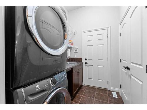 236 Aspenmere Close, Chestermere, AB - Indoor Photo Showing Laundry Room