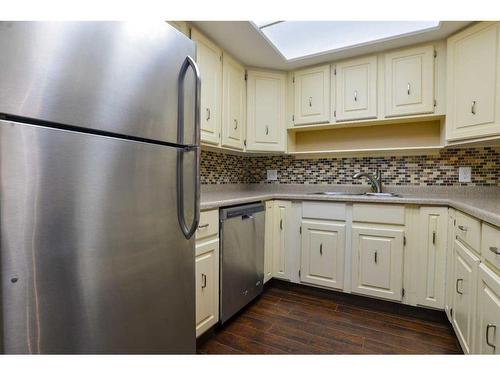 109-3719B 49 Street Nw, Calgary, AB - Indoor Photo Showing Kitchen With Stainless Steel Kitchen