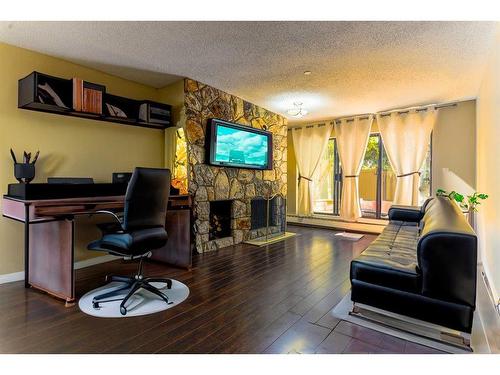 109-3719B 49 Street Nw, Calgary, AB - Indoor With Fireplace