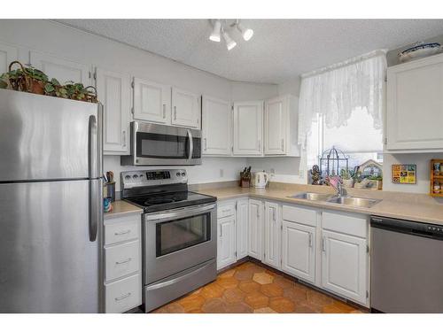 403-1001 14 Avenue Sw, Calgary, AB - Indoor Photo Showing Kitchen With Stainless Steel Kitchen With Double Sink