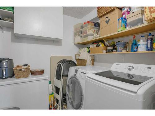 403-1001 14 Avenue Sw, Calgary, AB - Indoor Photo Showing Laundry Room