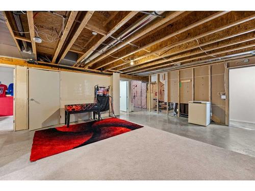 12 Mackenzie Way, Carstairs, AB - Indoor Photo Showing Basement