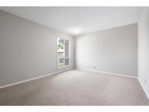 214-15403 Deer Run Drive Se, Calgary, AB - Indoor Photo Showing Other Room