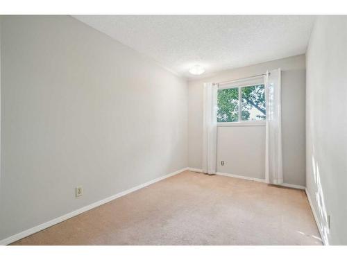 214-15403 Deer Run Drive Se, Calgary, AB - Indoor Photo Showing Other Room