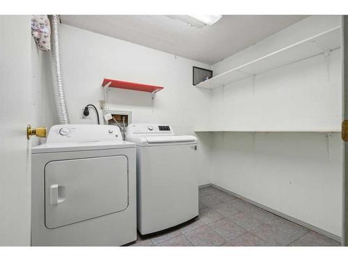 214-15403 Deer Run Drive Se, Calgary, AB - Indoor Photo Showing Laundry Room