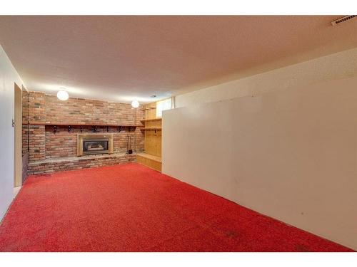 3924 76 Street Nw, Calgary, AB - Indoor Photo Showing Other Room With Fireplace