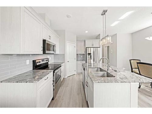 69 Legacy Glen Street Se, Calgary, AB - Indoor Photo Showing Kitchen With Stainless Steel Kitchen With Double Sink With Upgraded Kitchen