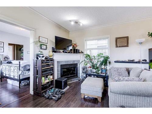 359-333 Riverfront Avenue Se, Calgary, AB - Indoor Photo Showing Living Room With Fireplace